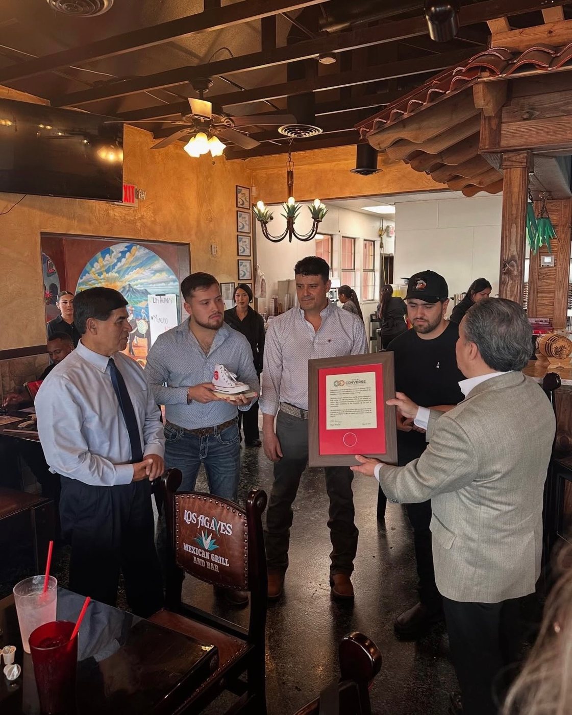 The City of Converse presenting a framed proclamation to the Los Agaves family