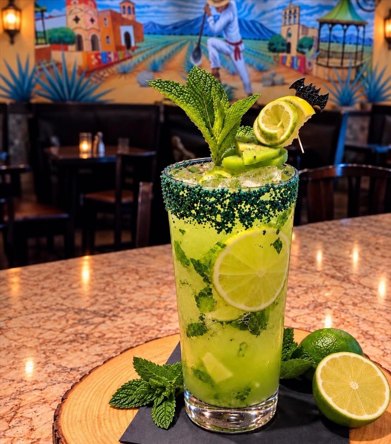 Poison Ivy Mojito with mint, lime and kiwi at Los Agaves